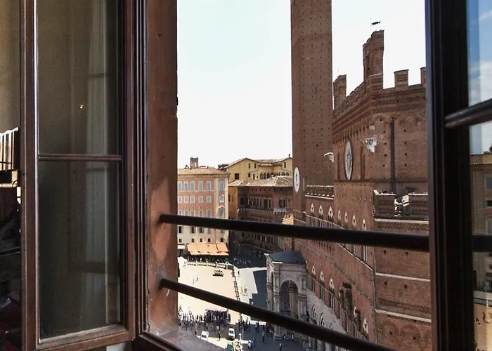 Апартаменты Torre Dei Lambertini Windows On Piazza Del Campo - Residenza D'epoca *